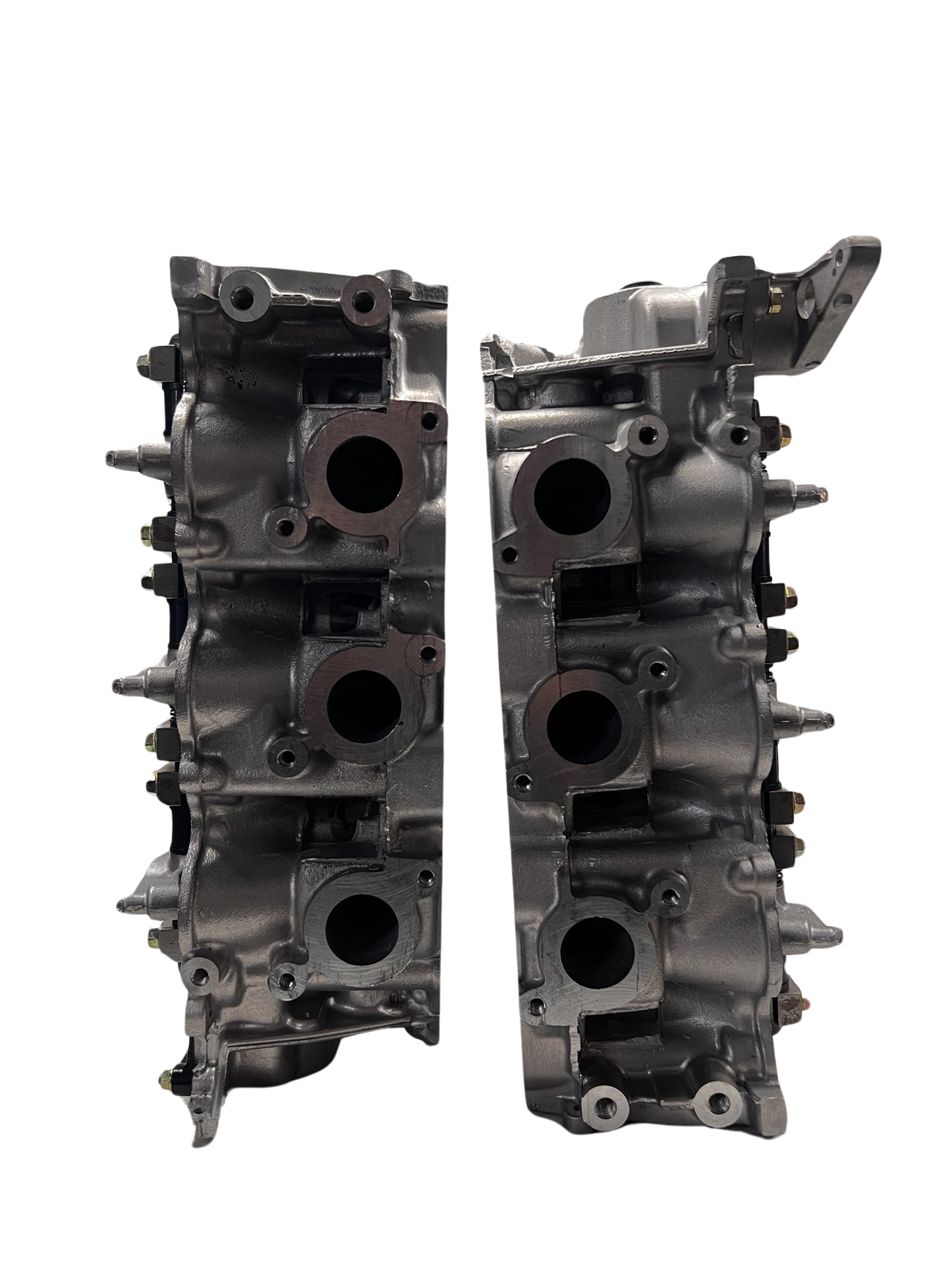 Exhaust side of cylinder head for a NEW Mazda 3.0L Casting #JE06 (SOLD IN PAIR)