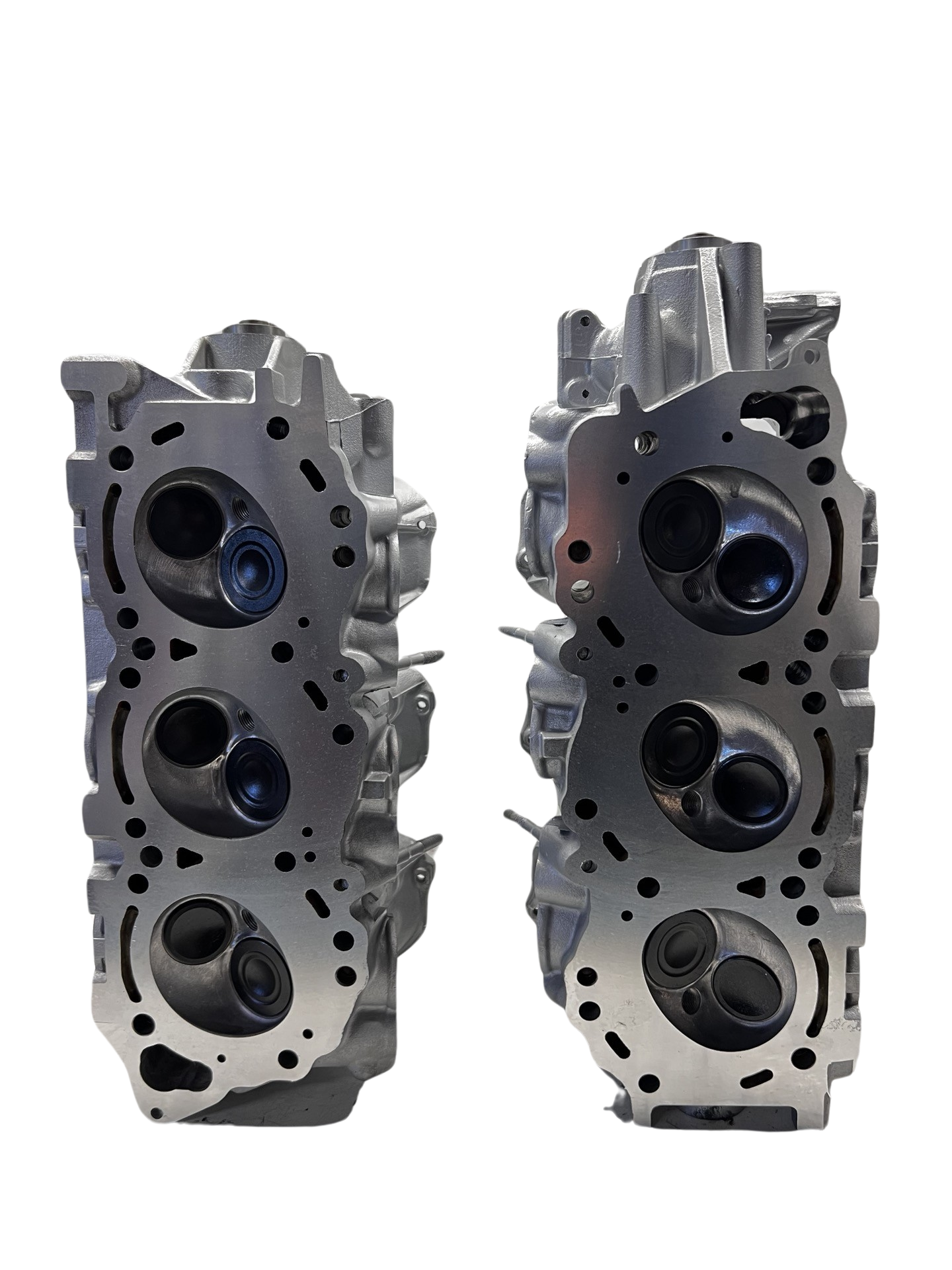 Bottom side of cylinder heads for a Nissan 3.3L SOHC Casting #OWO VG33E (SOLD IN PAIR)