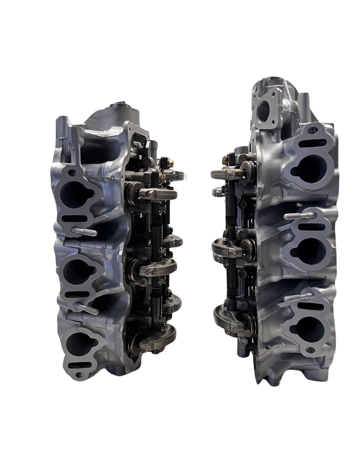 Intake side of cylinder head for a Nissan 3.3L SOHC Casting #OWO VG33E (SOLD IN PAIR)